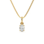 This yellow gold Oval Solitaire Diamond Necklace made with an oval cut diamond in a four prong setting with adjustable chain in top view