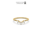 This yellow gold ring displayed in front view is made with round brilliant-cut diamonds and baguette diamonds all set in a shared prong setting