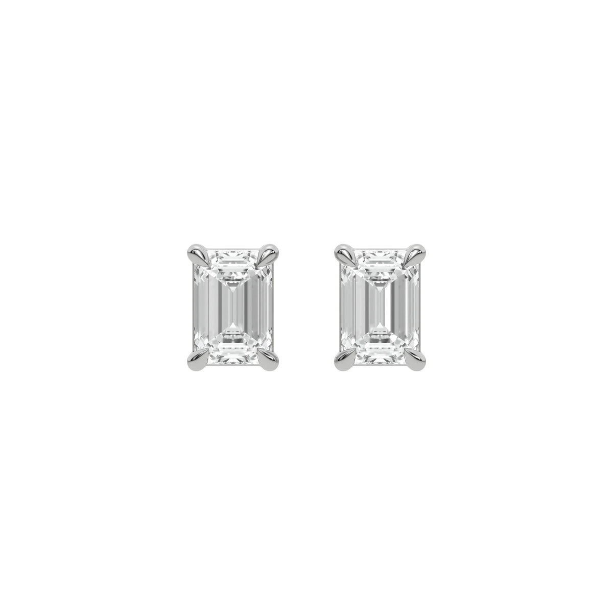 Pair of fine jewelry featuring an Emerald diamond stud earring in prong-set and yellow gold on a white background.