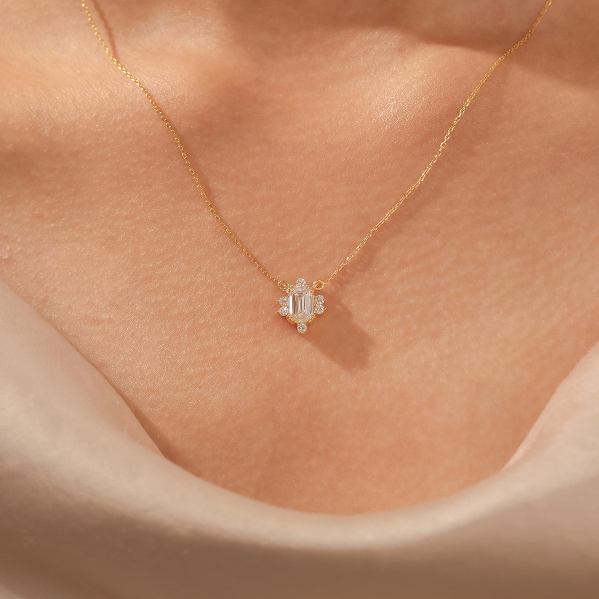 14K Yellow Gold Emerald and Round Cut Diamond Starburst Pendant