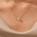 14K Yellow Gold Emerald and Round Cut Diamond Starburst Pendant