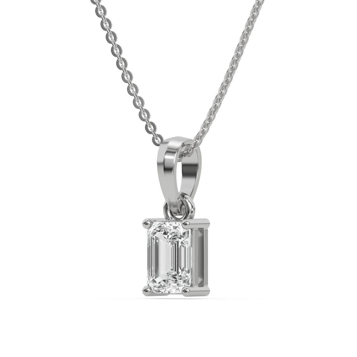 This white gold Emerald Solitaire Diamond Necklace made with an emerald cut diamond in a four prong setting with adjustable chain in side view