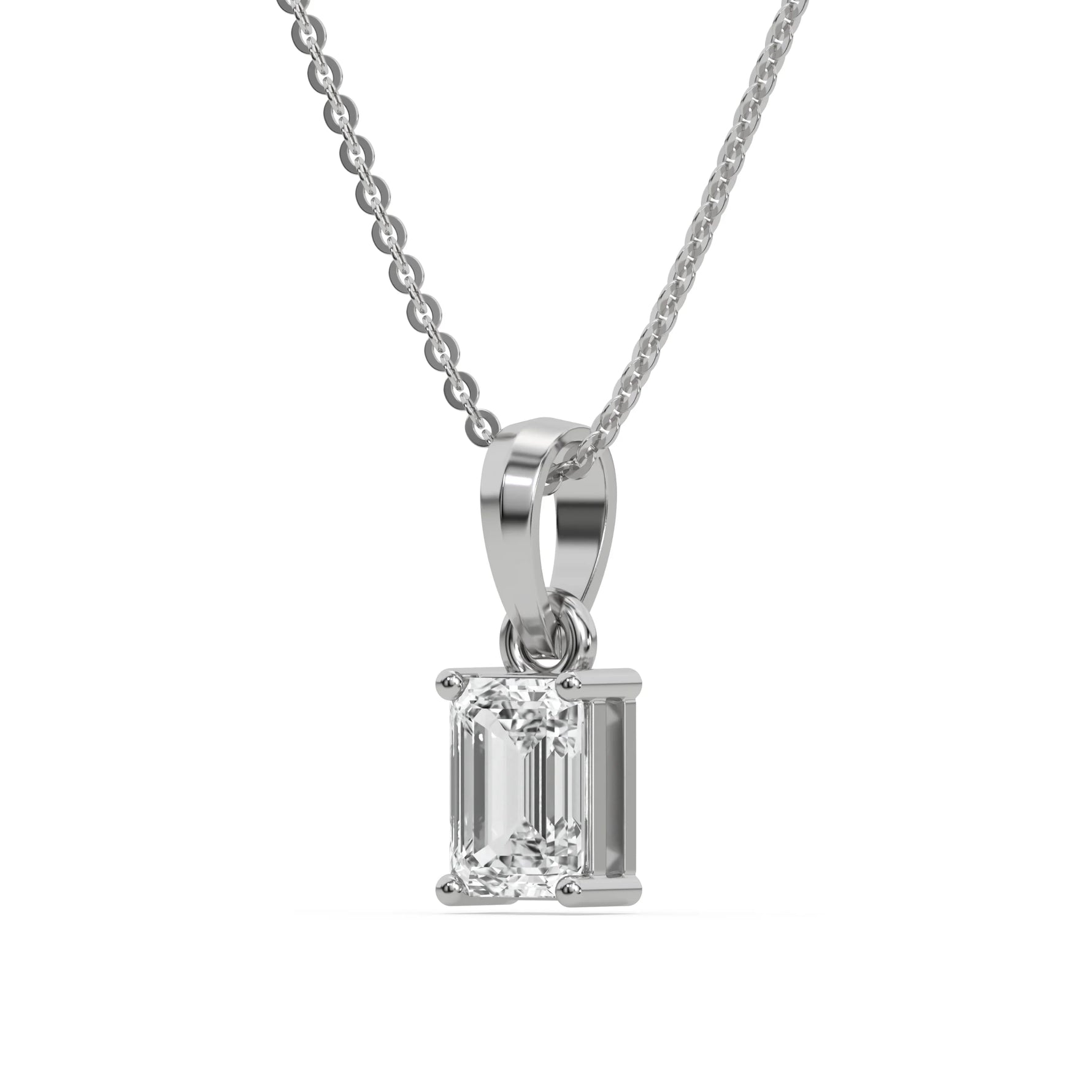 This white gold Emerald Solitaire Diamond Necklace made with an emerald cut diamond in a four prong setting with adjustable chain in side view