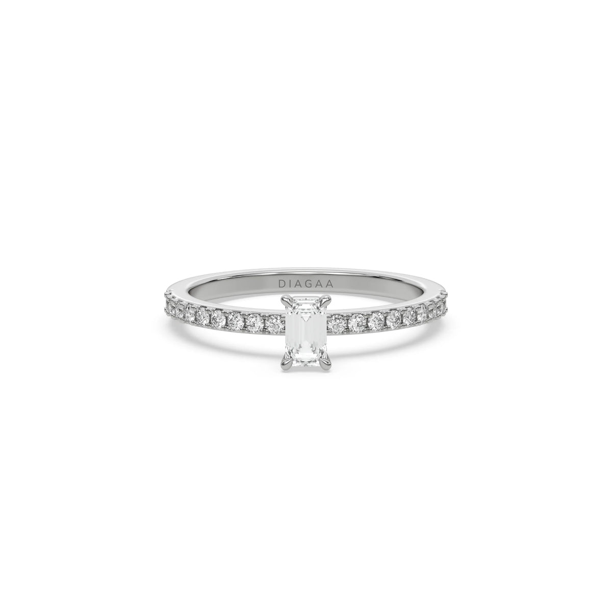 This white gold ring displayed in front view is made with a emerald solitaire diamond set in four-prong setting