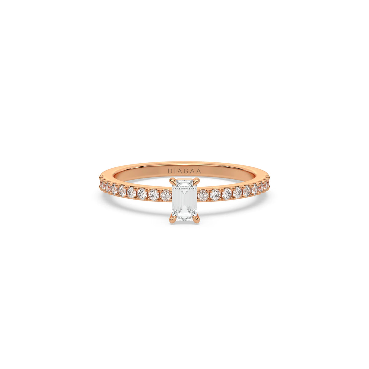 This rose gold ring displayed in front view is made with a emerald solitaire diamond set in four-prong setting