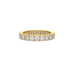 This yellow gold ring displayed in front view is made with brilliant cut round diamonds and set in a beautiful pave setting