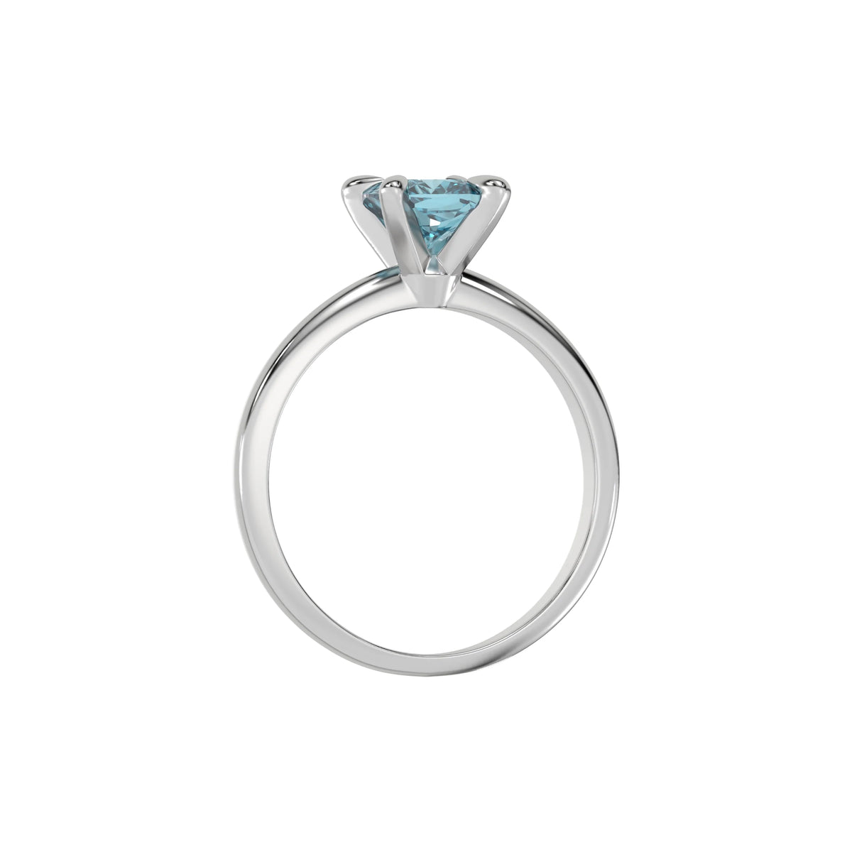 This white gold ring features a fancy Blue cushion solitaire diamond elegantly secured in a four-prong setting on a solid gold band in through finger view