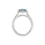 This white gold ring features a fancy Blue round solitaire diamond set in a four-prong setting in through finger view