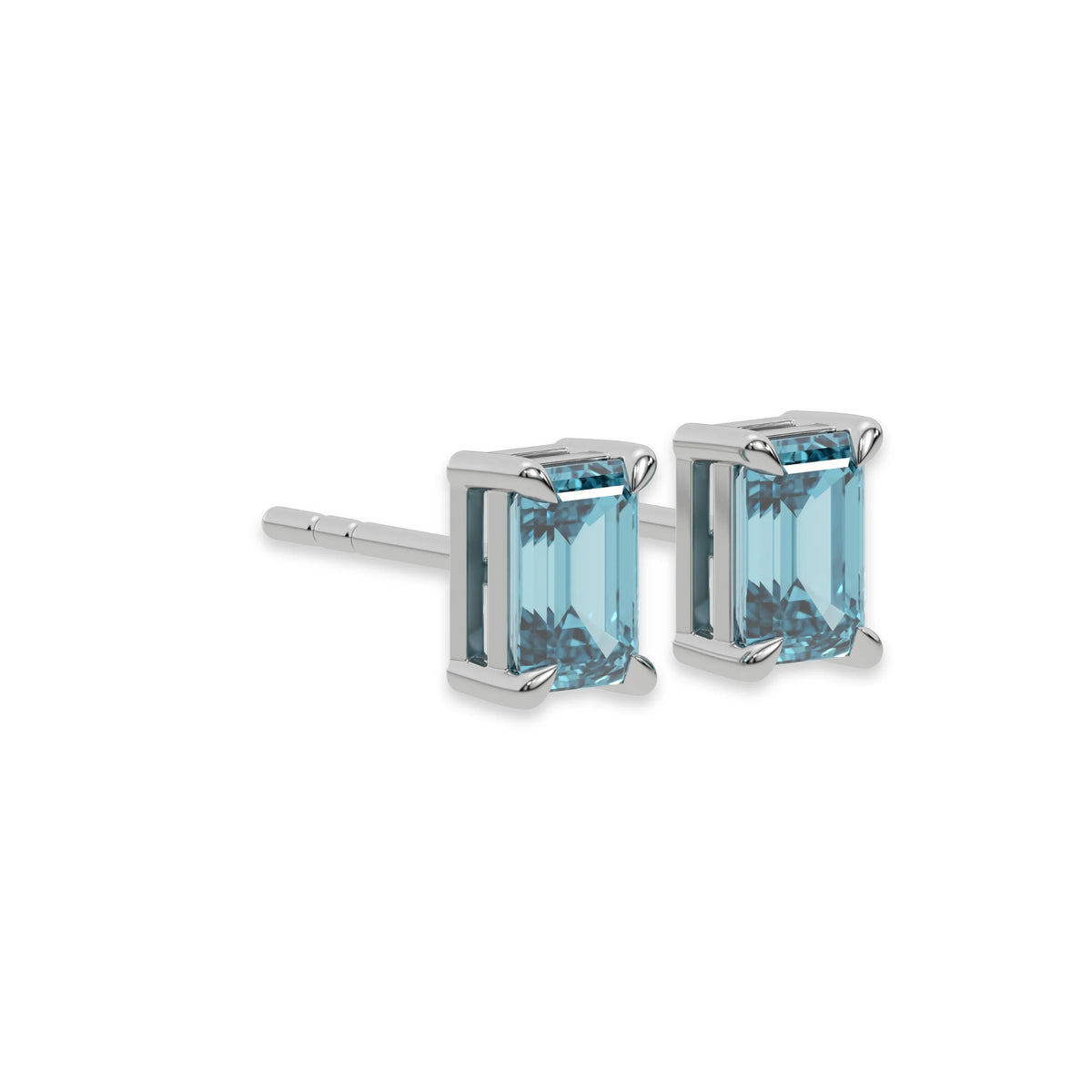 This white gold Classic Emerald Diamond Earrings made with an fancy blue emerald-cut diamonds set in a four prong setting in side view