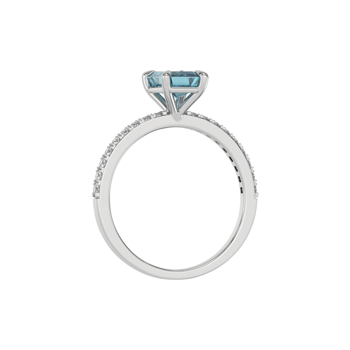 This white gold ring displayed in through finger view is made with a emerald solitaire diamond set in four-prong setting