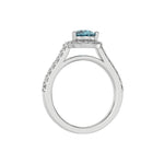 This white gold Pear Diamond Halo Engagement Ring is made with a fancy blue pear solitaire diamond set in a four-prong setting in through finger view