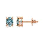 18k rose gold oval diamond stud earrings made with a fancy blue oval cut diamond set in a four prong setting