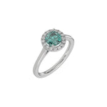 This white gold ring features a fancy Green round solitaire diamond set in a four-prong setting in 3D view