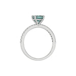 This White gold ring displayed in through finger view is made with a cushion solitaire diamond set in four-prong setting