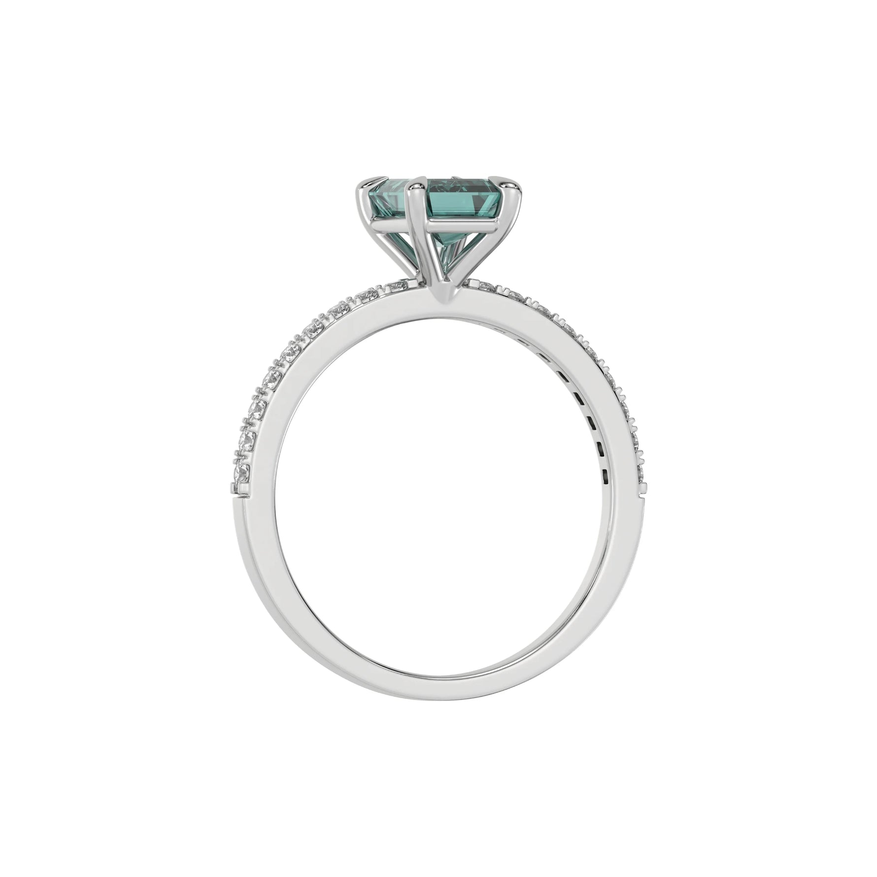 This white gold ring displayed in through finger  view is made with a emerald solitaire diamond set in four-prong setting