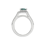 This white gold Pear Diamond Halo Engagement Ring is made with a fancy green pear solitaire diamond set in a four-prong setting in through finger view