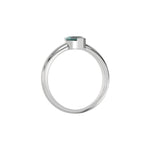 This white gold ring features a fancy Green marquise solitaire diamond elegantly secured in a two v-prong setting on a solid gold band in through finger view