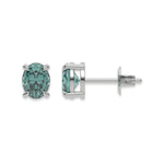18k white gold Oval Diamond Earrings made with a fancy green oval cut diamond set in a four prong setting
