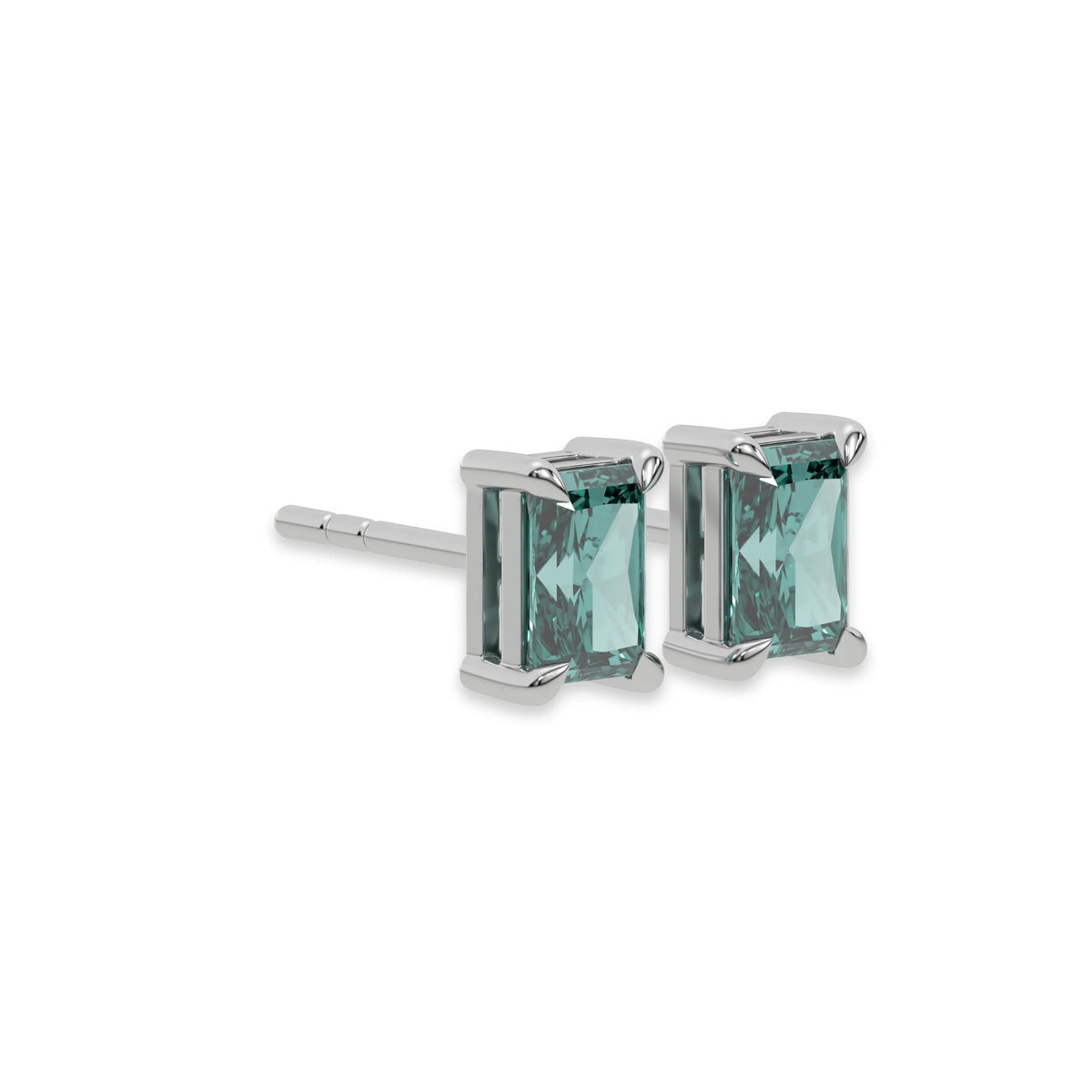 This white gold Classic Radiant Diamond Earrings made with a fancy green radiant-cut diamonds set in a four prong setting in side view