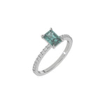 This white gold ring displayed in 3d view is made with a radiant solitaire diamond set in four-prong setting