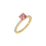 This yellow gold ring displayed in 3d view is made with a cushion solitaire diamond set in four-prong setting