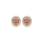 18k yellow gold Oval Diamond Halo Earrings made with an fancy pink oval cut solitaire diamonds set in a four prong setting