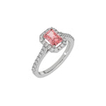 This white gold Radiant Diamond Halo Engagement Ring is made with a fancy pink radiant solitaire diamond set in a four-prong setting in 3D view