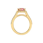 This yellow gold Round Diamond Halo Engagement Ring is made with a fancy Pink round solitaire diamond set in a four-prong setting in through finger view