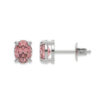18k white gold oval diamond earrings made with a fancy pink oval cut diamond set in a four prong setting