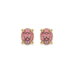 18k white gold oval diamond earrings made with a fancy pink oval cut diamond set in a four prong setting