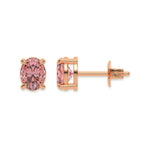 10k rose gold oval diamond earrings made with a fancy pink oval cut diamond set in a four prong setting