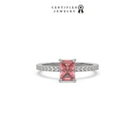 This white gold ring displayed in front view is made with a radiant solitaire diamond set in four-prong setting