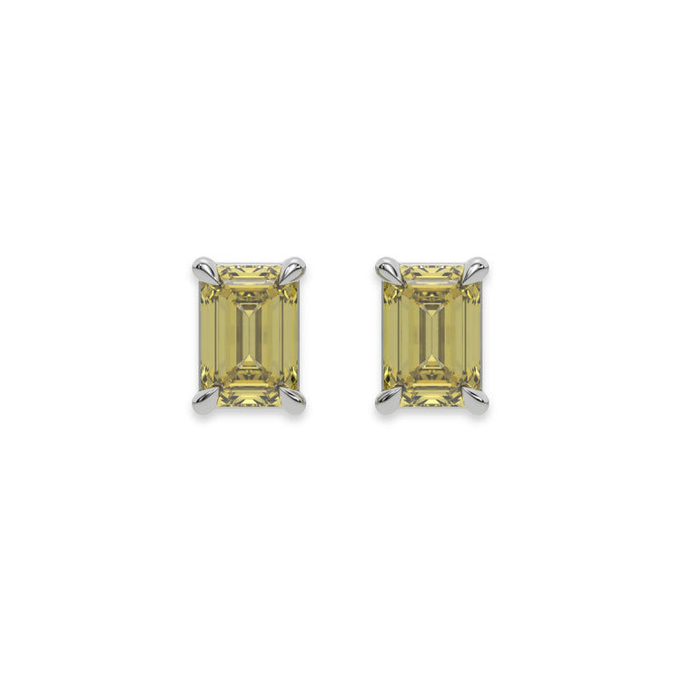 This white gold Classic Emerald Diamond Earrings made with an fancy yellow emerald-cut diamonds set in a four prong setting in top view