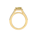 This yellow gold Emerald Diamond Halo Engagement Ring is made with a fancy yellow emerald solitaire diamond set in a four-prong setting in through finger view