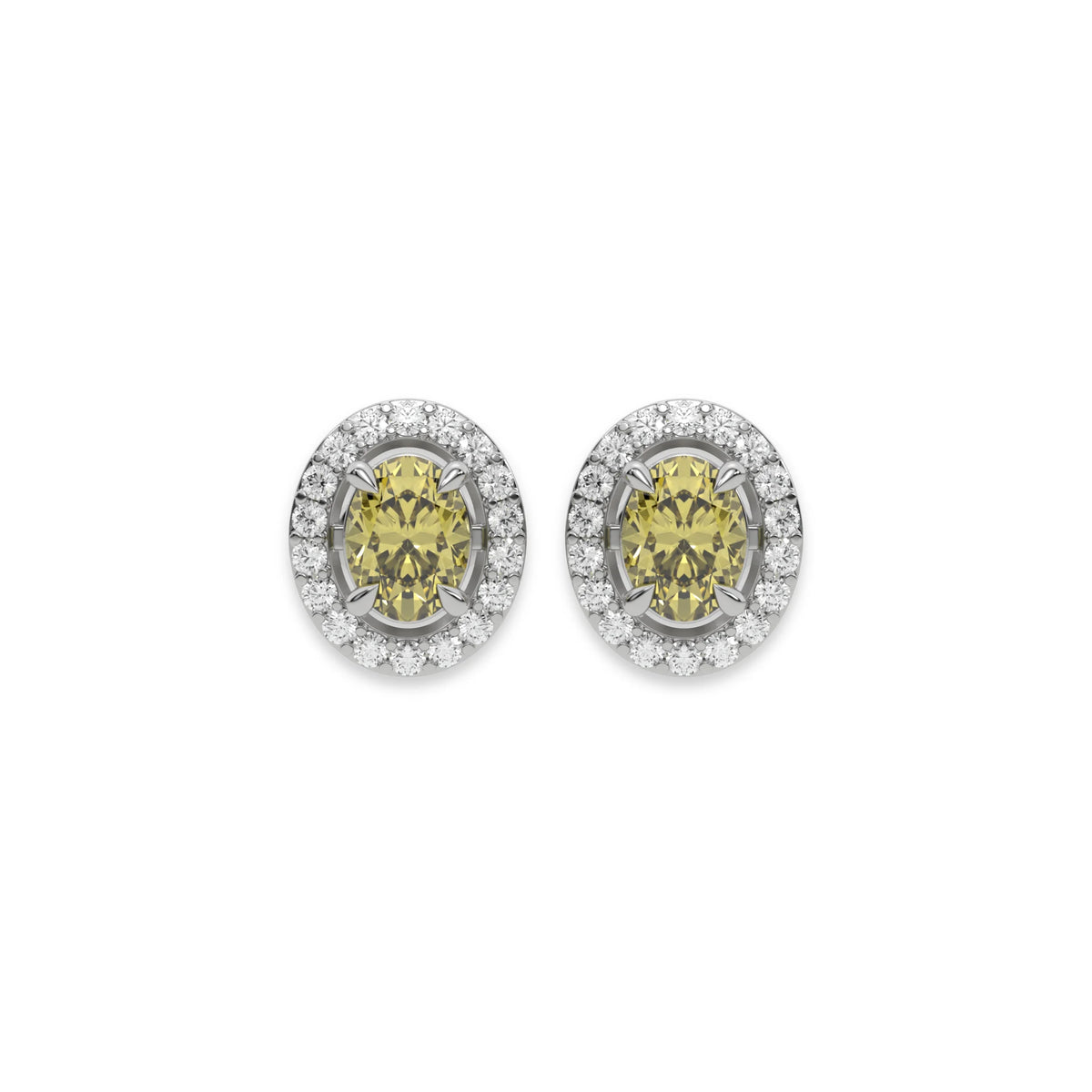 White gold Oval Diamond Halo Earrings made with a fancy yellow oval cut solitaire diamonds set in a four prong setting 