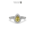 This white gold ring displayed in front view is made with a pear solitaire diamond set in four-prong setting