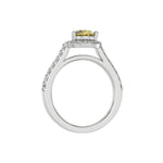 This white gold Pear Diamond Halo Engagement Ring is made with a fancy yellow pear solitaire diamond set in a four-prong setting in through finger view