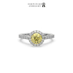 This yellow gold ring displayed in front view is made with a round solitaire diamond set in four-prong setting