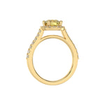 This yellow gold Round Diamond Halo Engagement Ring is made with a fancy Yellow round solitaire diamond set in a four-prong setting in through finger view