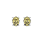 10k white gold oval diamond stud Earrings made with an fancy yellow oval cut diamond set in a four prong setting