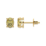18k yellow gold oval diamond stud Earrings made with an fancy yellow oval cut diamond set in a four prong setting