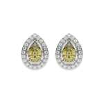 10k white gold Pear Diamond Halo Earrings made with a fancy yellow pear cut solitaire diamonds set in a four prong setting.