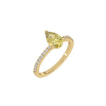 This yellow gold ring is made with a fancy Yellow pear solitaire diamond set in three-prong setting, and is complemented by a round pave diamonds band in 3D view