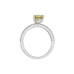 This white gold ring is made with a fancy Yellow pear solitaire diamond set in three-prong setting, and is complemented by a round pave diamonds band in through finger view