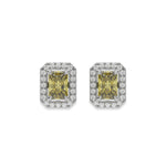 14k White gold Radiant Diamond Halo Earrings made with a fancy yellow radiant cut solitaire diamonds set in a four prong setting