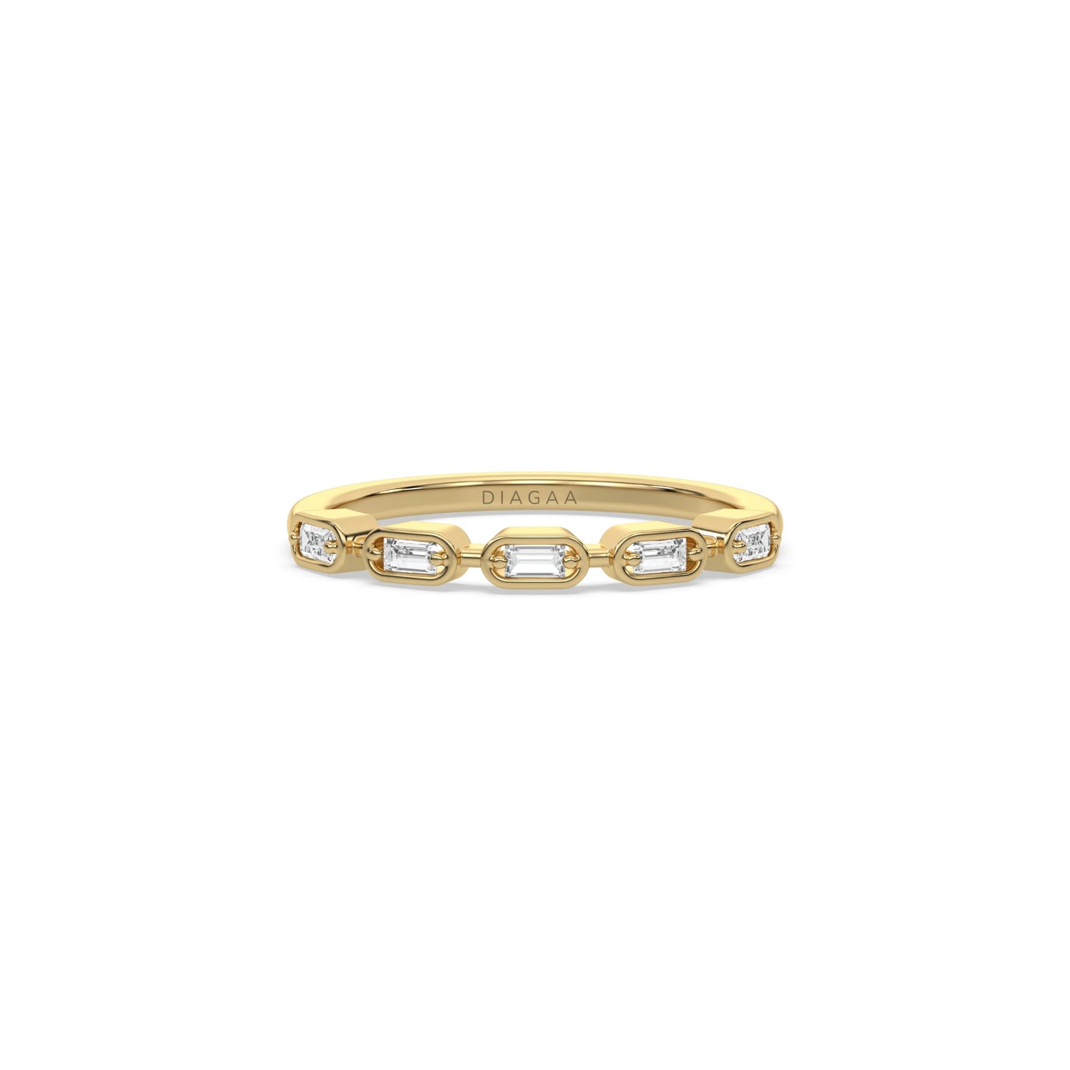 yellow gold band ring set with horizontal baguette cut diamonds in gold frames. Elegant fine jewelry wedding band for women.
