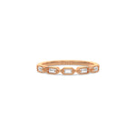 This rose gold ring displayed on front view is made with five baguette diamonds and arranged in a horizontal orientation, while each diamond is set individually in a bezel setting