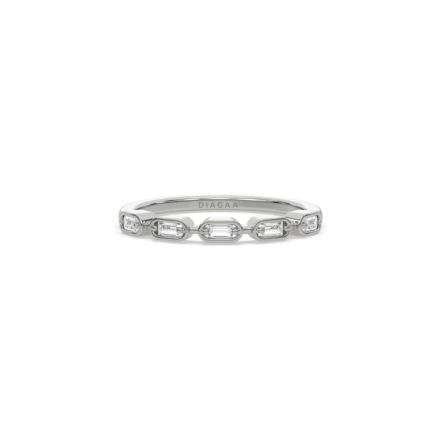 white gold band ring set with horizontal baguette cut diamonds in gold frames. Elegant fine jewelry wedding band for women.