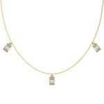 Oval Dangling Diamond Necklace made with five oval cut diamonds each set in a prong setting, distributed evenly along the chain