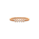 This rose gold 5 Round Diamond Ring handmade with five round brilliant-cut diamonds and set in a shared four prong setting with milgrain detailing on the band in top view